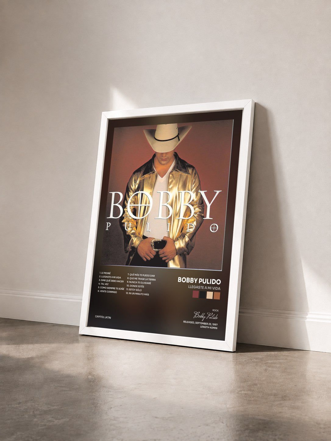 #blanc Tableau de l'album Llegaste A Mi Vida de Bobby Pulido vu de trois quarts, cadre blanc