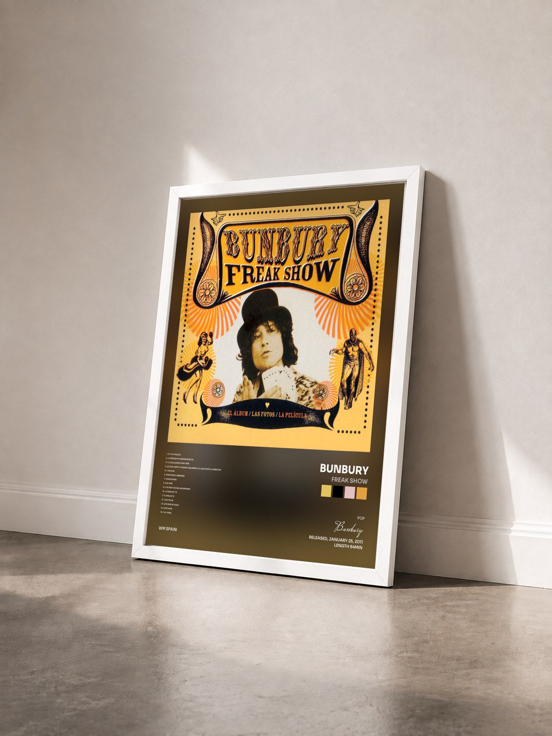#blanc Tableau de l'album Freak Show de Bunbury vu de trois quarts, cadre blanc