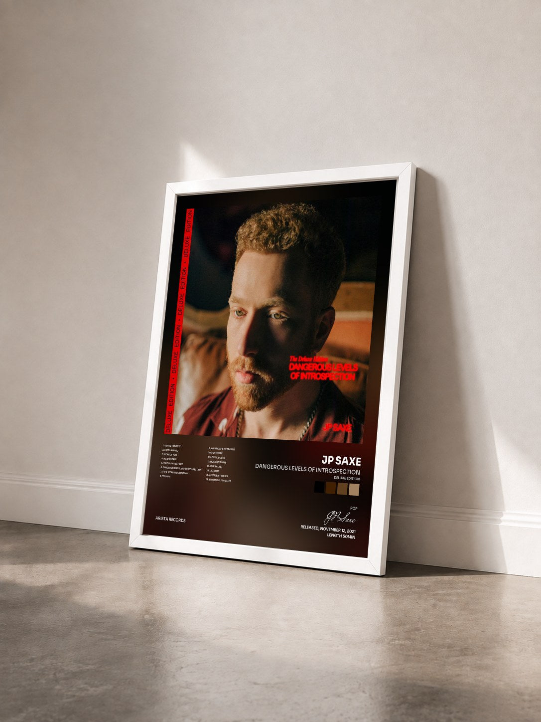 #blanc Tableau de l'album Dangerous Levels of Introspection (Deluxe Edition) de JP Saxe vu de trois quarts, cadre blanc