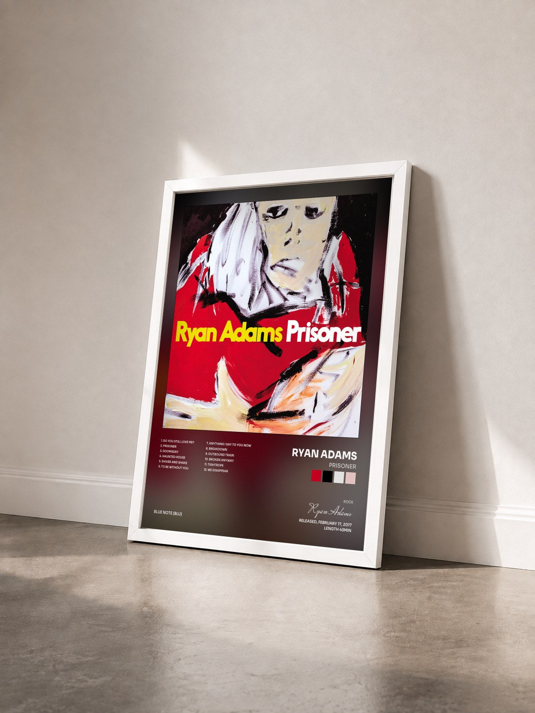 #blanc Tableau de l'album Prisoner de Ryan Adams vu de trois quarts, cadre blanc