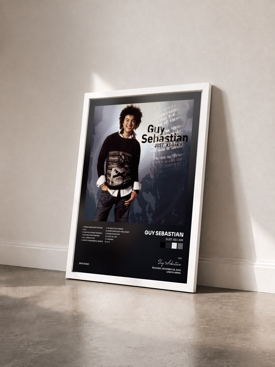 #blanc Tableau de l'album Just As I Am de Guy Sebastian vu de trois quarts, cadre blanc