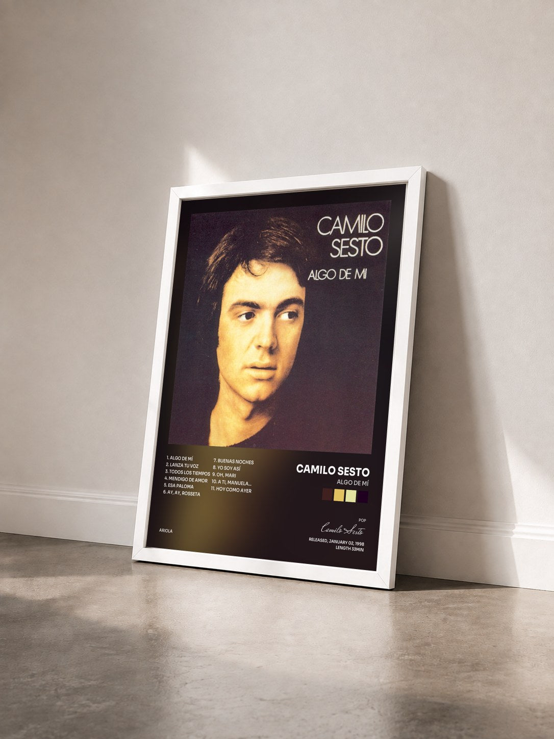 #blanc Tableau de l'album Algo de Mí de Camilo Sesto vu de trois quarts, cadre blanc
