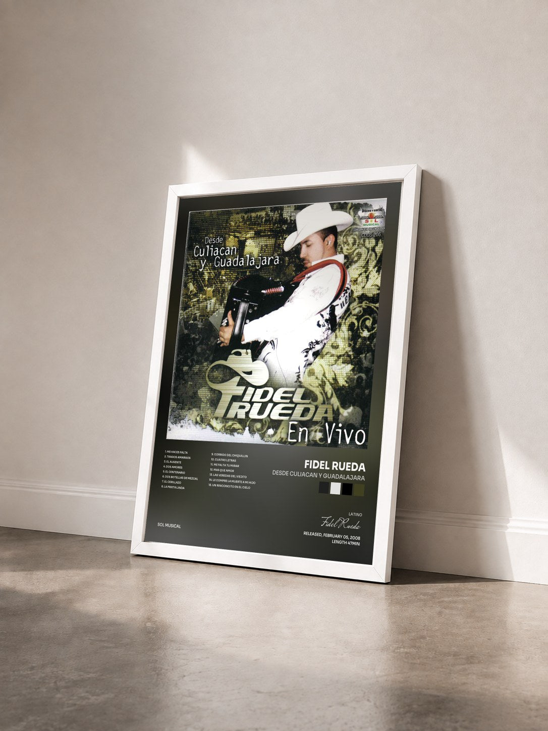 #blanc Tableau de l'album Desde Culiacan y Guadalajara de Fidel Rueda vu de trois quarts, cadre blanc