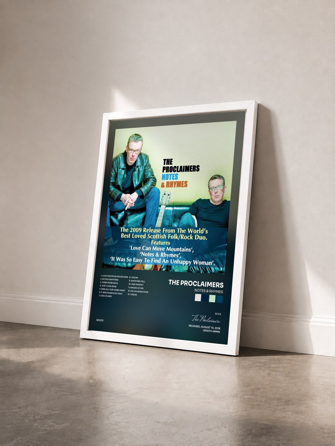 #blanc Tableau de l'album Notes & Rhymes de The Proclaimers vu de trois quarts, cadre blanc