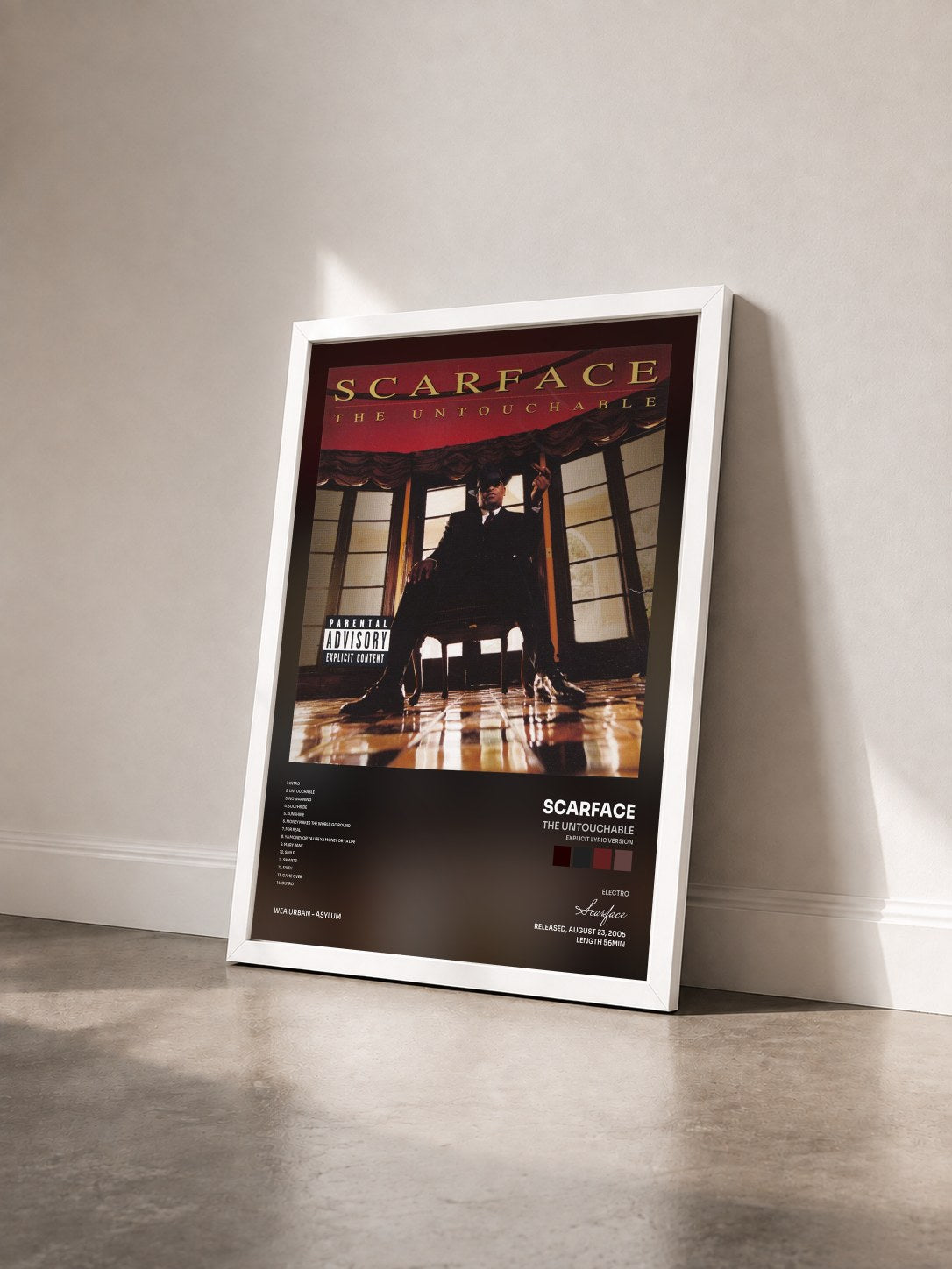 #blanc Tableau de l'album The Untouchable (Explicit Lyric Version) de Scarface vu de trois quarts, cadre blanc