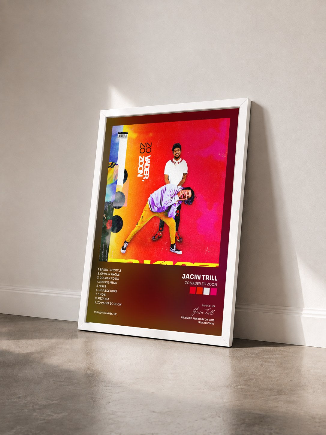 #blanc Tableau de l'album Zo Vader Zo Zoon de Jacin Trill vu de trois quarts, cadre blanc