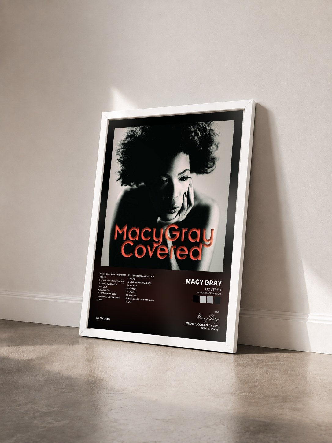 #blanc Tableau de l'album Covered (Bonus Track Version) de Macy Gray vu de trois quarts, cadre blanc