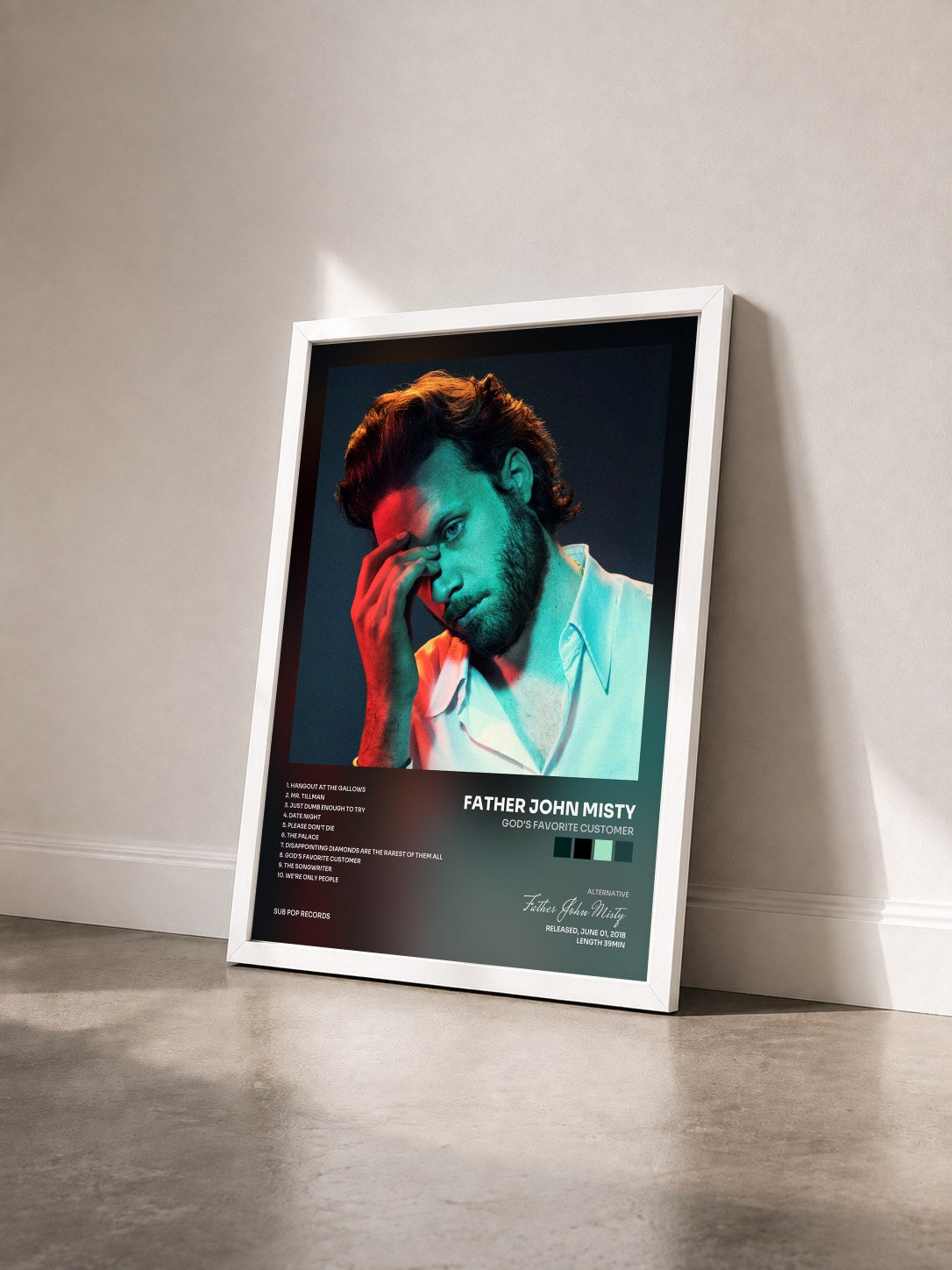 #blanc Tableau de l'album God's Favorite Customer de Father John Misty vu de trois quarts, cadre blanc