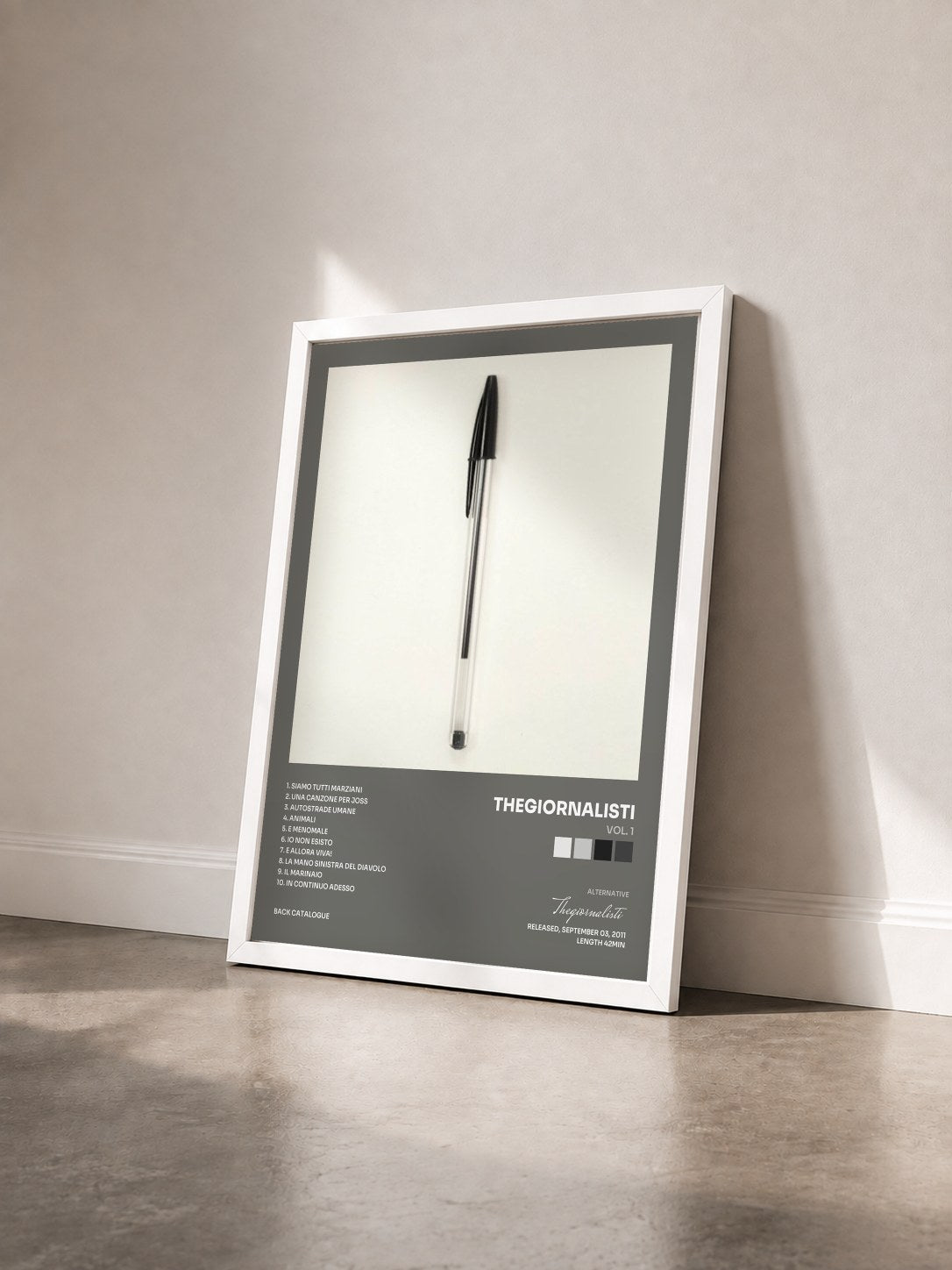 #blanc Tableau de l'album Vol. 1 de Thegiornalisti vu de trois quarts, cadre blanc