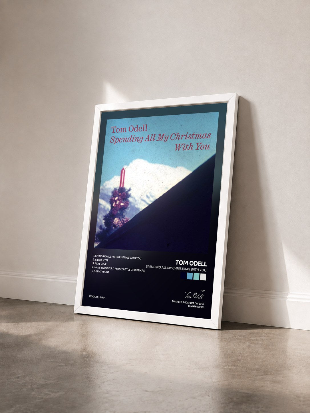 #blanc Tableau de l'album Spending All My Christmas with You de Tom Odell vu de trois quarts, cadre blanc