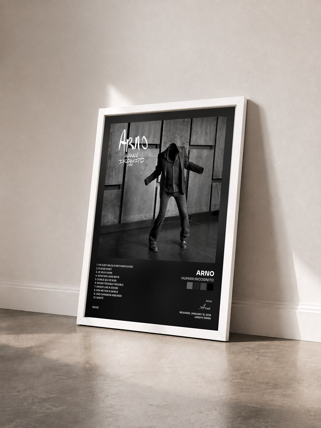 #blanc Tableau de l'album Human incognito de Arno vu de trois quarts, cadre blanc