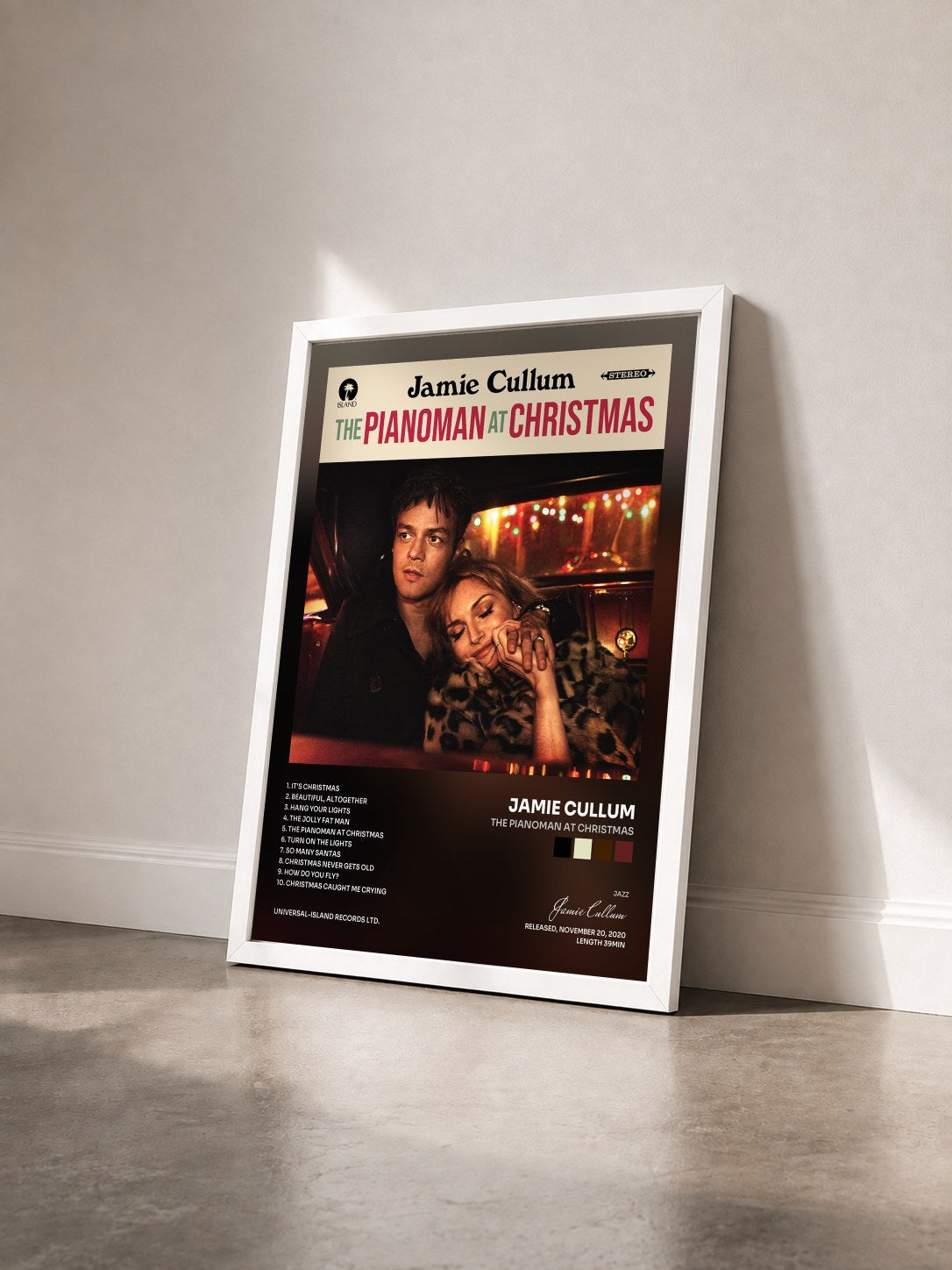 #blanc Tableau de l'album The Pianoman at Christmas de Jamie Cullum vu de trois quarts, cadre blanc