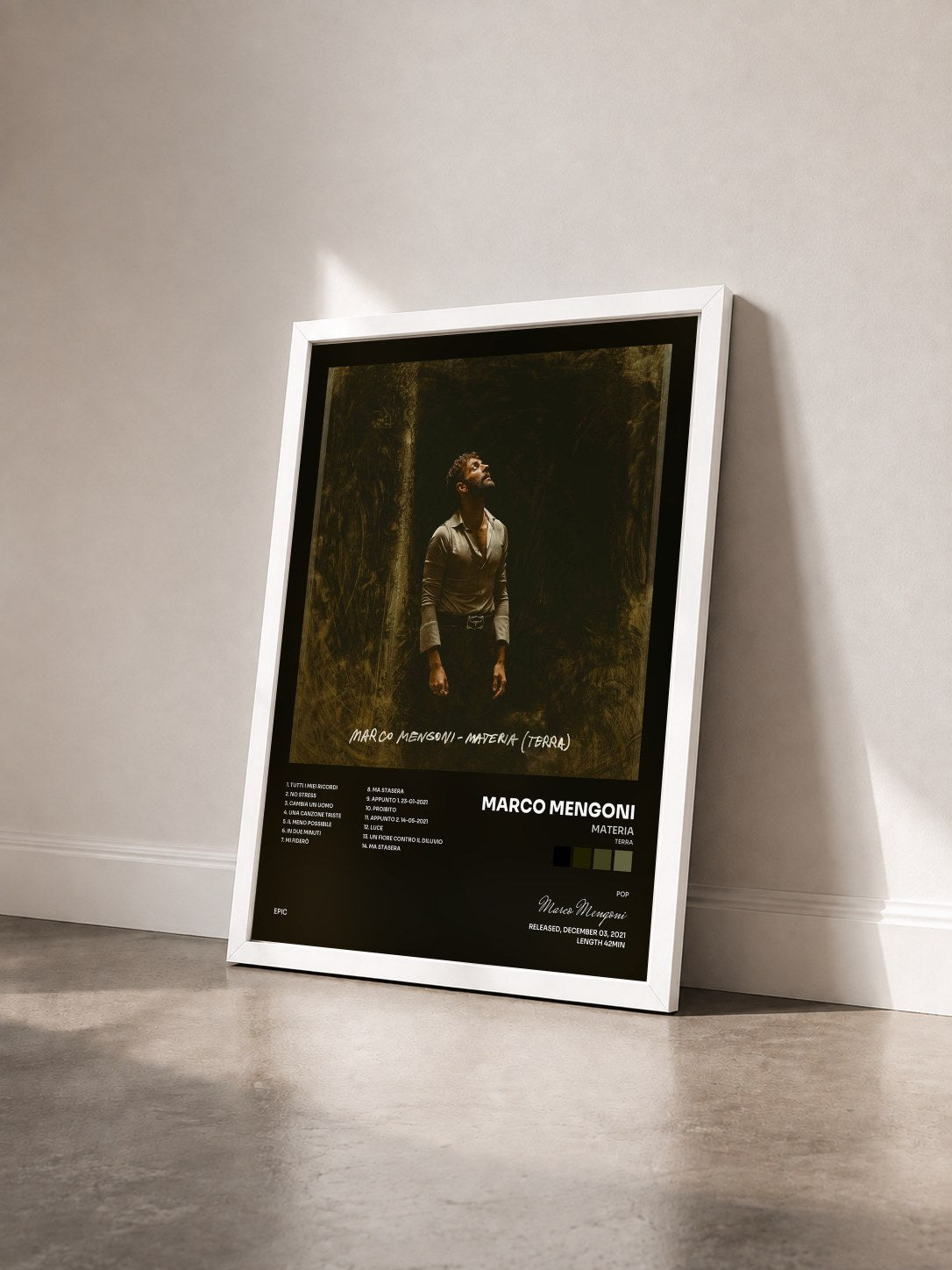 #blanc Tableau de l'album MATERIA (TERRA) de Marco Mengoni vu de trois quarts, cadre blanc