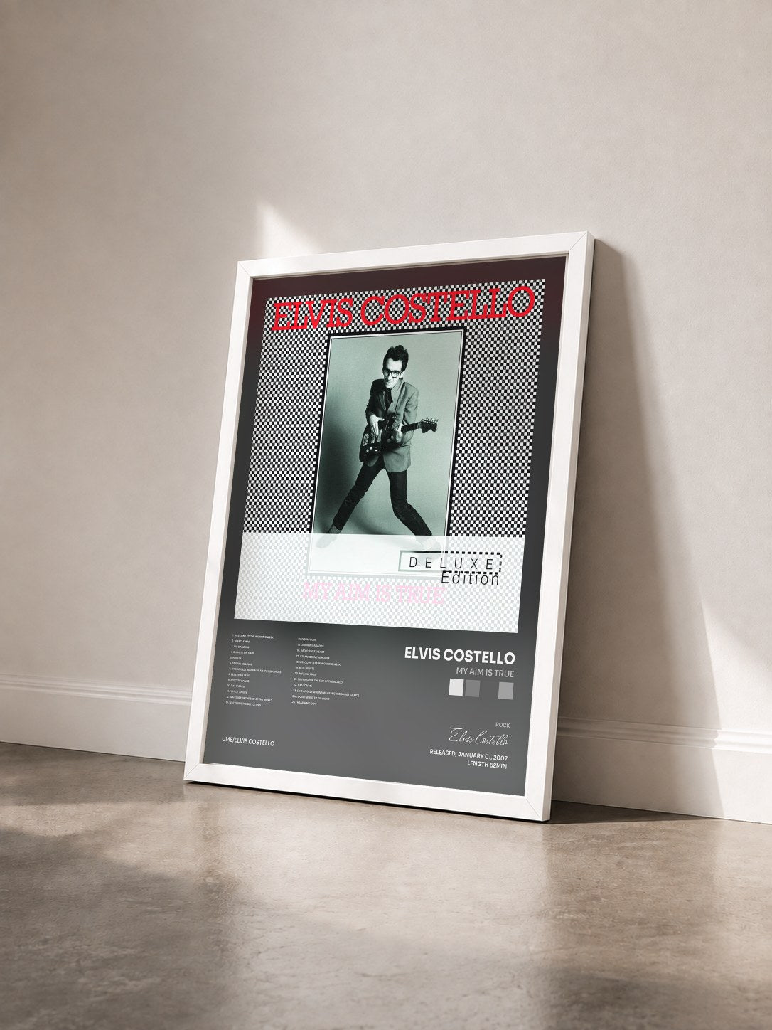 #blanc Tableau de l'album My Aim Is True de Elvis Costello vu de trois quarts, cadre blanc