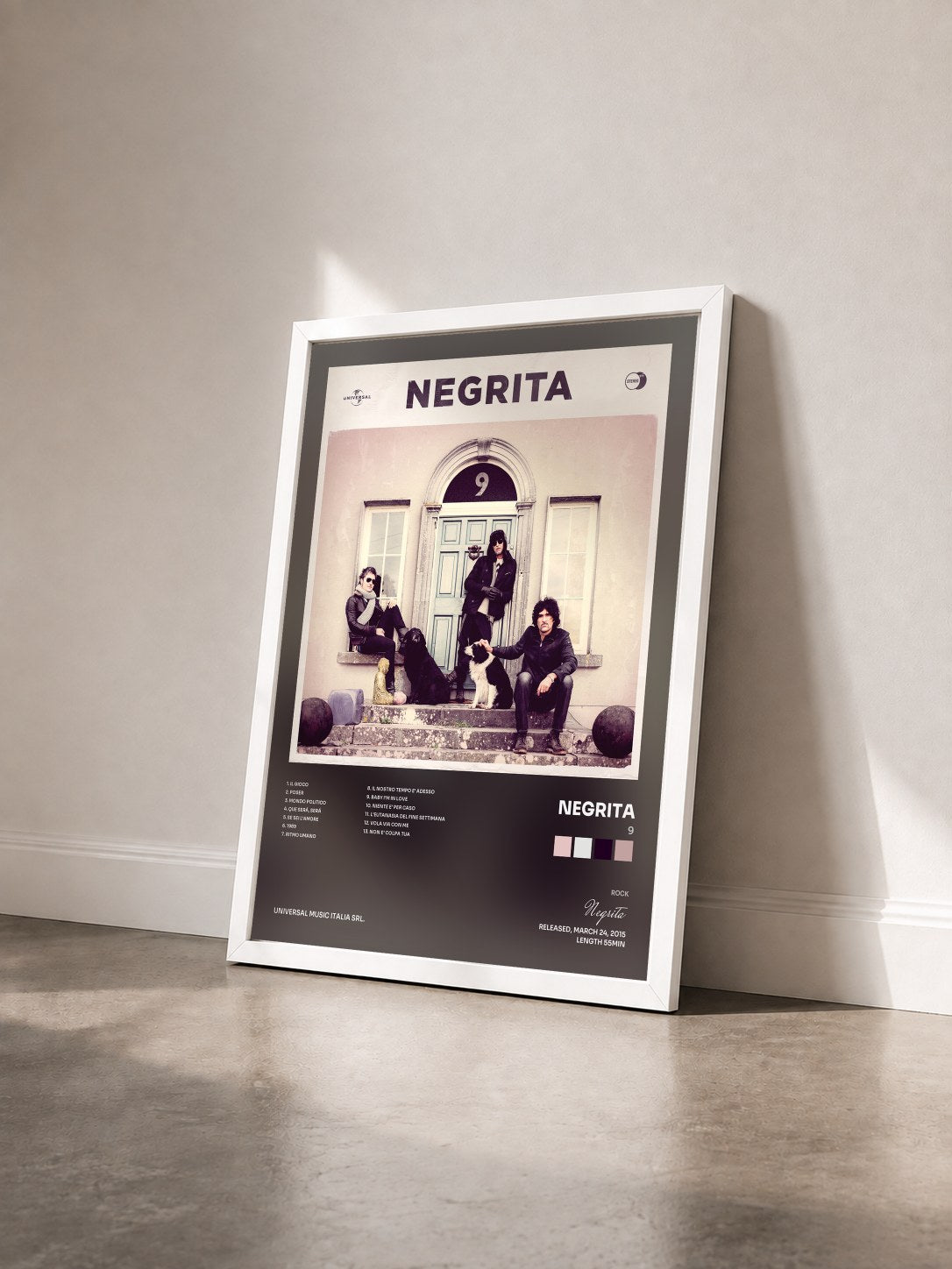 #blanc Tableau de l'album 9 de Negrita vu de trois quarts, cadre blanc