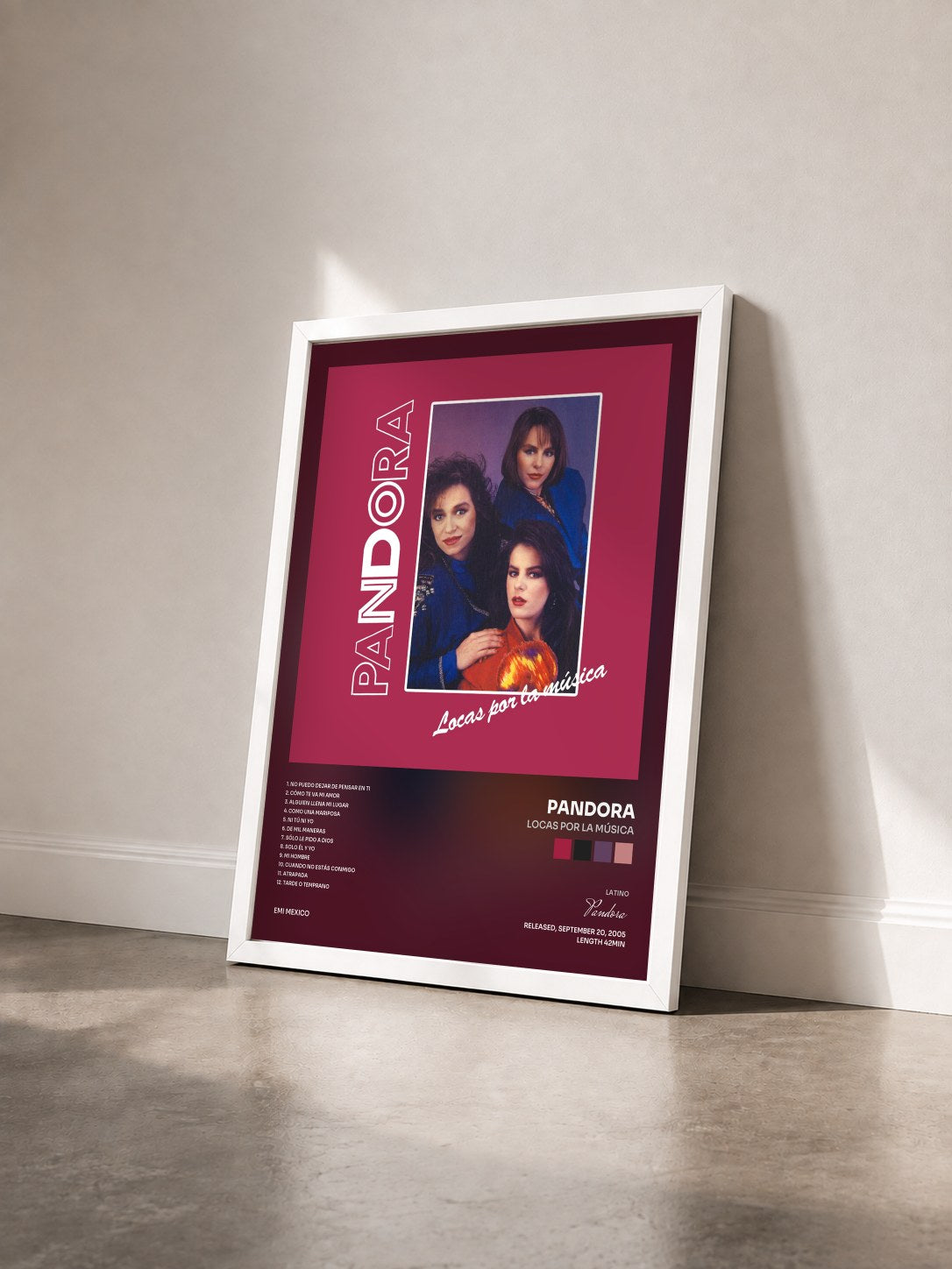 #blanc Tableau de l'album Locas Por La Música de Pandora vu de trois quarts, cadre blanc