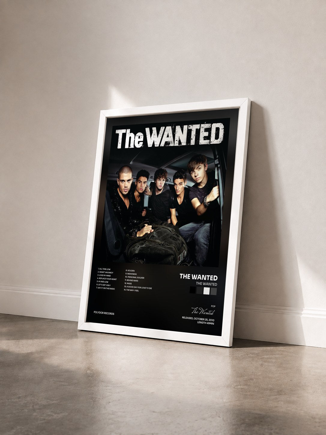#blanc Tableau de l'album The Wanted de The Wanted vu de trois quarts, cadre blanc