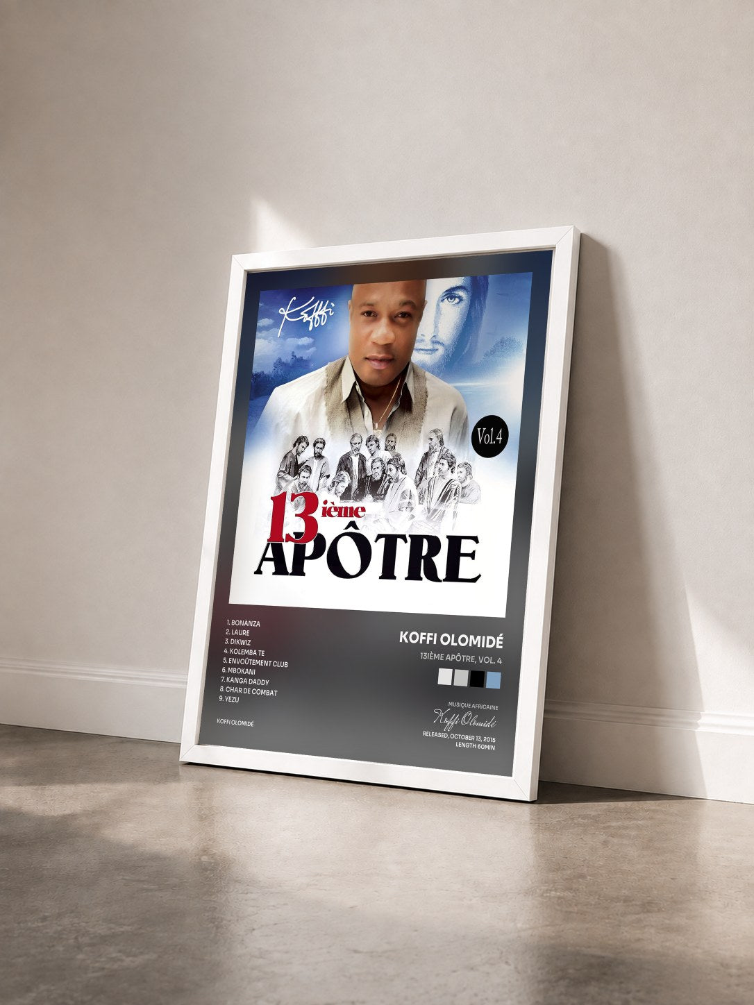 #blanc Tableau de l'album 13ième apôtre, Vol. 4 de Koffi Olomidé vu de trois quarts, cadre blanc