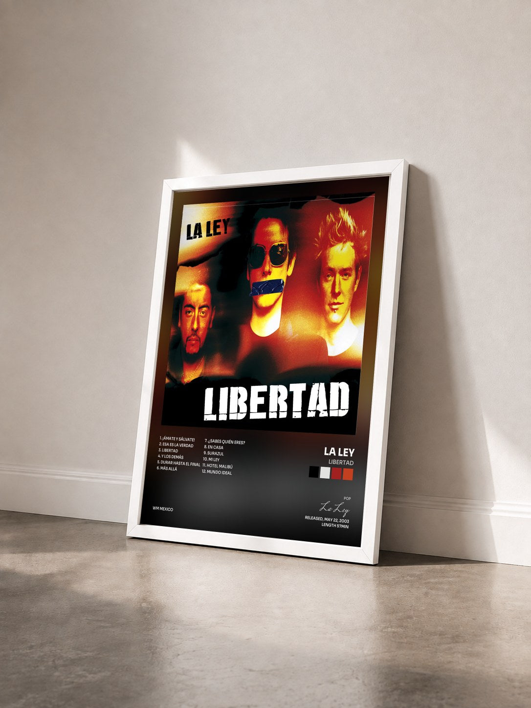 #blanc Tableau de l'album Libertad de La Ley vu de trois quarts, cadre blanc
