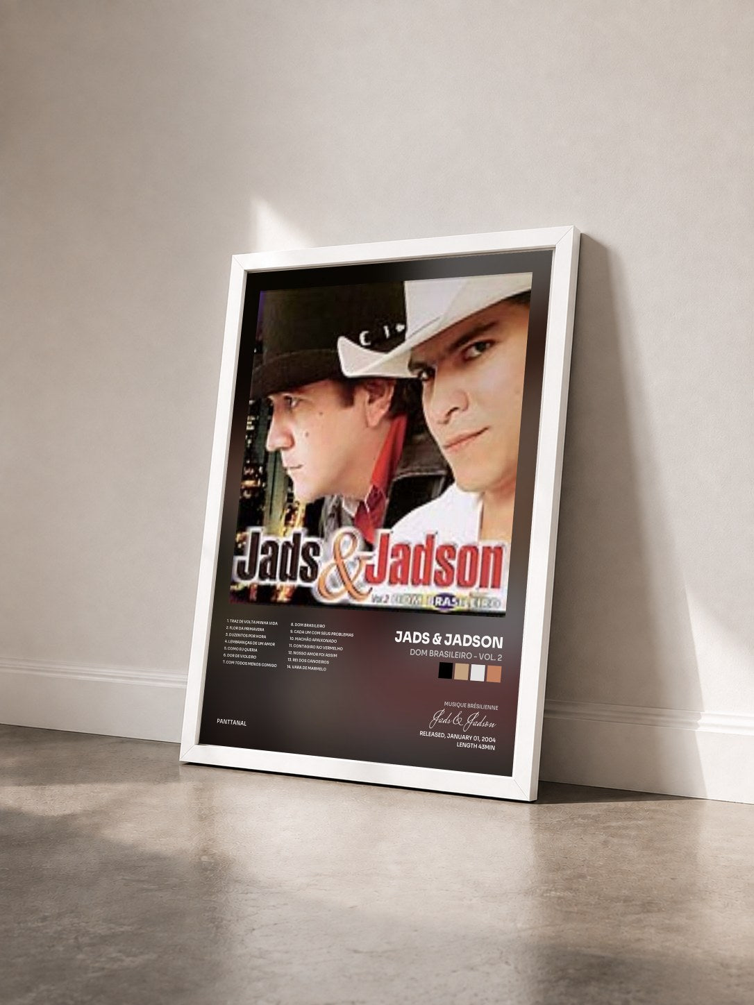 #blanc Tableau de l'album Dom Brasileiro - Vol. 2 de Jads & Jadson vu de trois quarts, cadre blanc