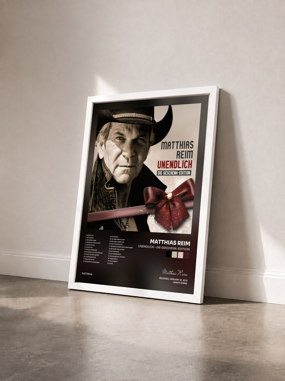 #blanc Tableau de l'album Unendlich - Die Geschenk-Edition de Matthias Reim vu de trois quarts, cadre blanc
