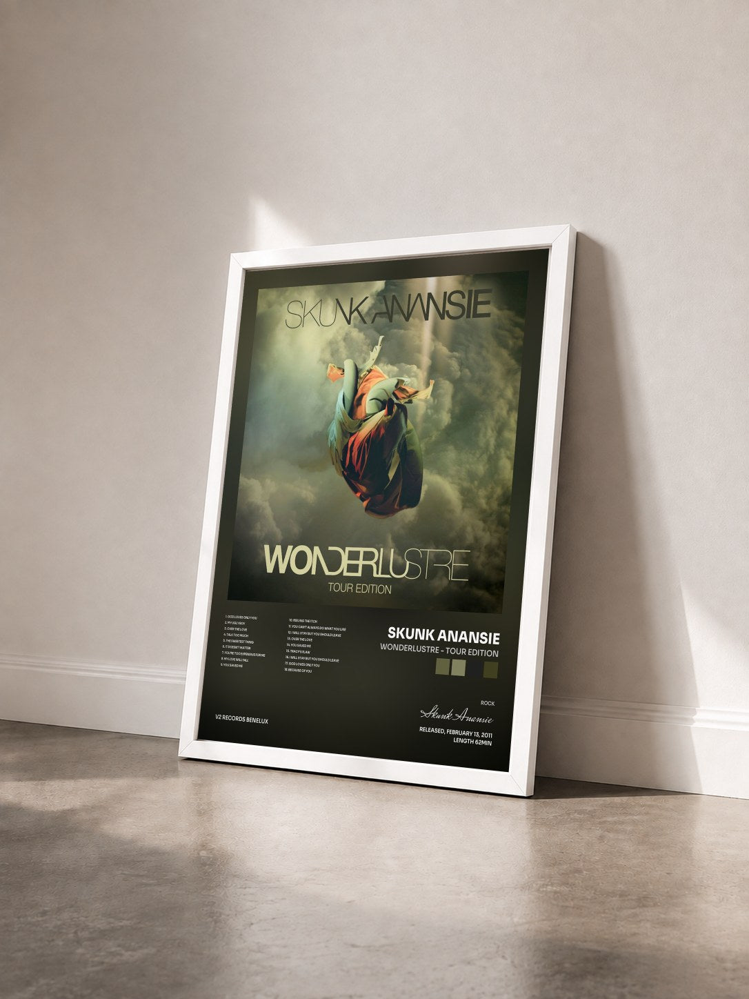 #blanc Tableau de l'album Wonderlustre - Tour Edition de Skunk Anansie vu de trois quarts, cadre blanc