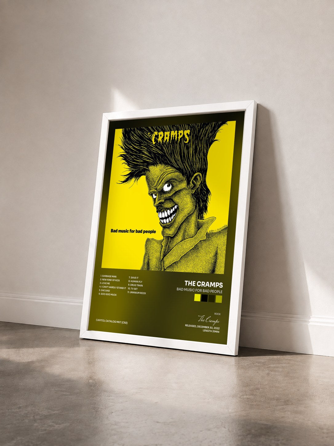 #blanc Tableau de l'album Bad Music For Bad People de The Cramps vu de trois quarts, cadre blanc