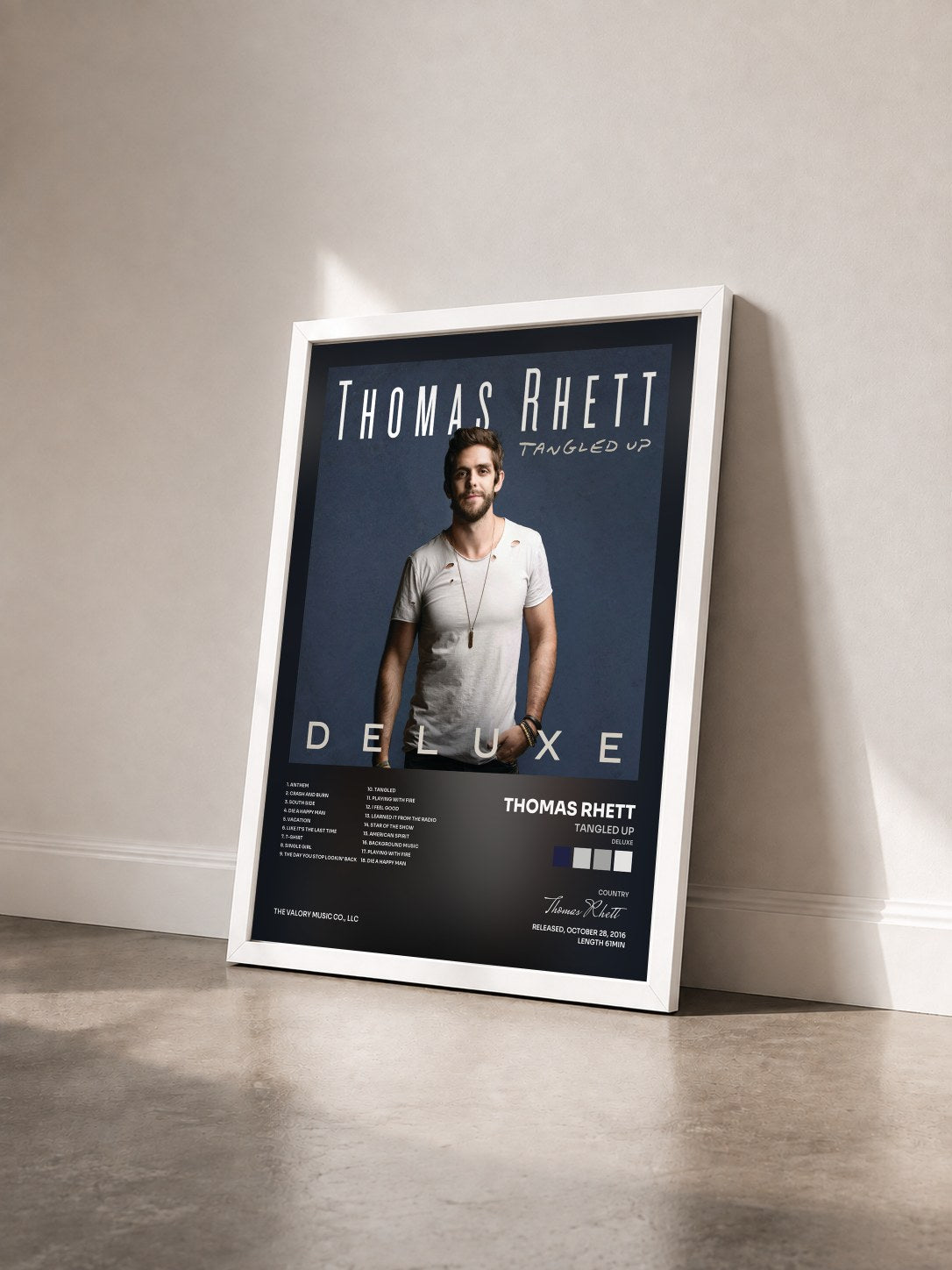 #blanc Tableau de l'album Tangled Up (Deluxe) de Thomas Rhett vu de trois quarts, cadre blanc