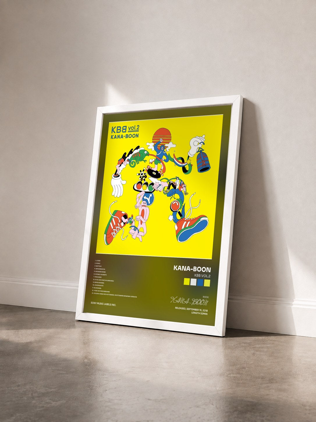 #blanc Tableau de l'album KBB vol.2 de KANA-BOON vu de trois quarts, cadre blanc