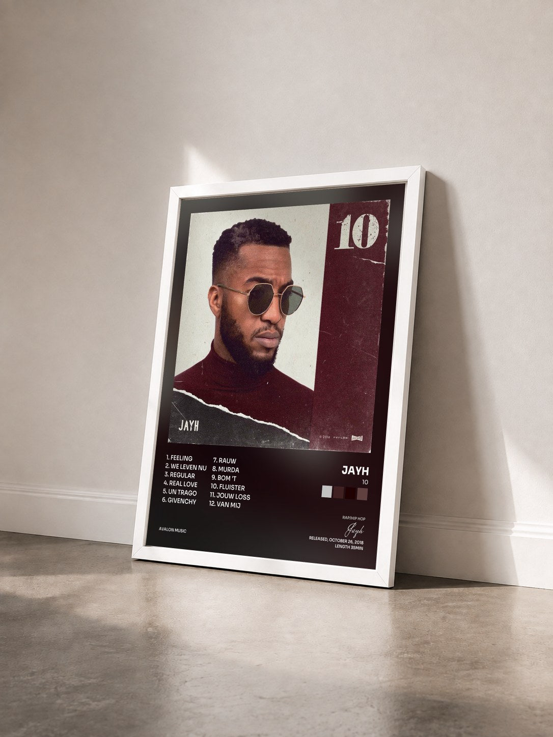 #blanc Tableau de l'album 10 de Jayh vu de trois quarts, cadre blanc