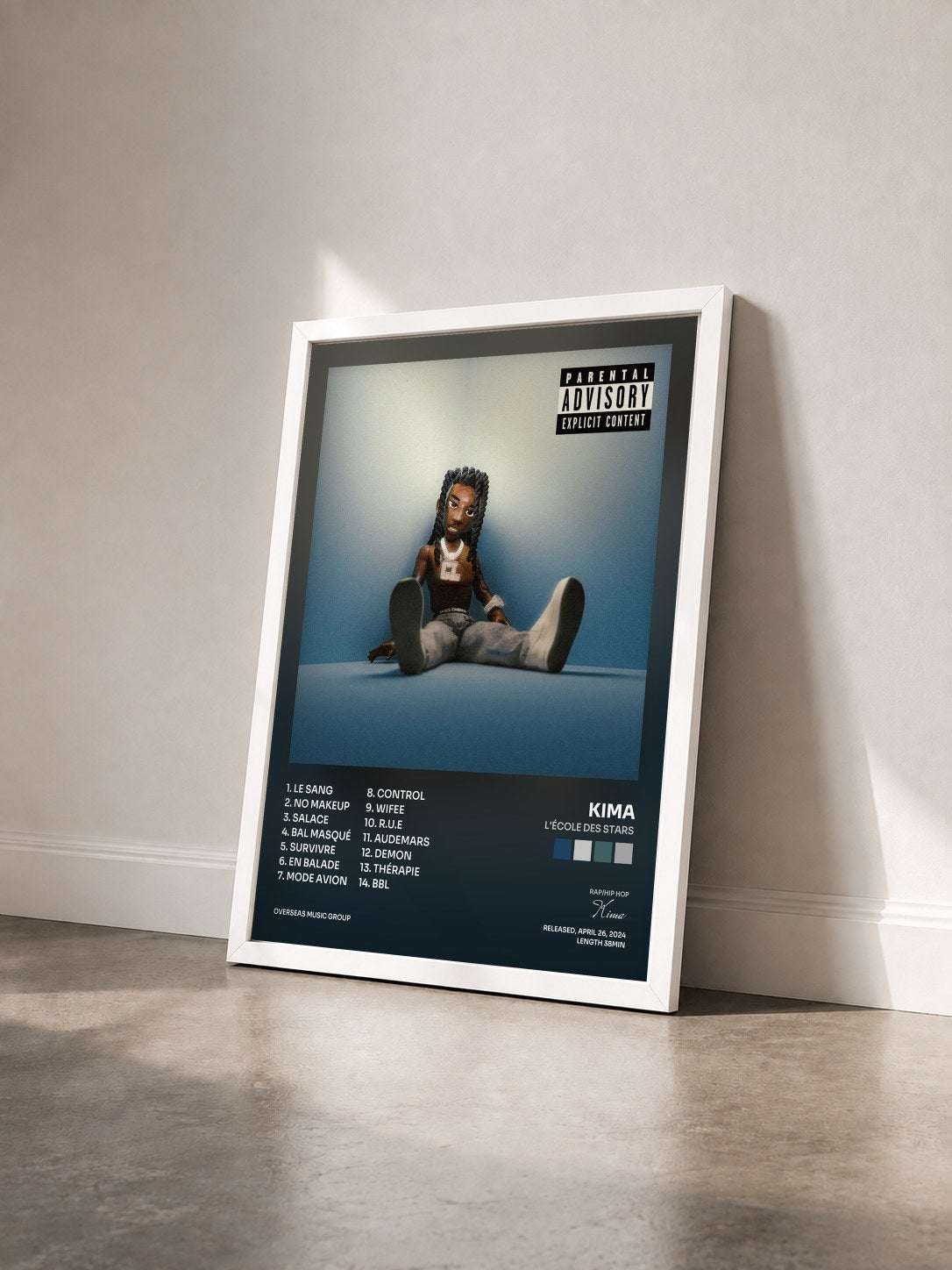 #blanc Tableau de l'album L'école des Stars de Kima vu de trois quarts, cadre blanc