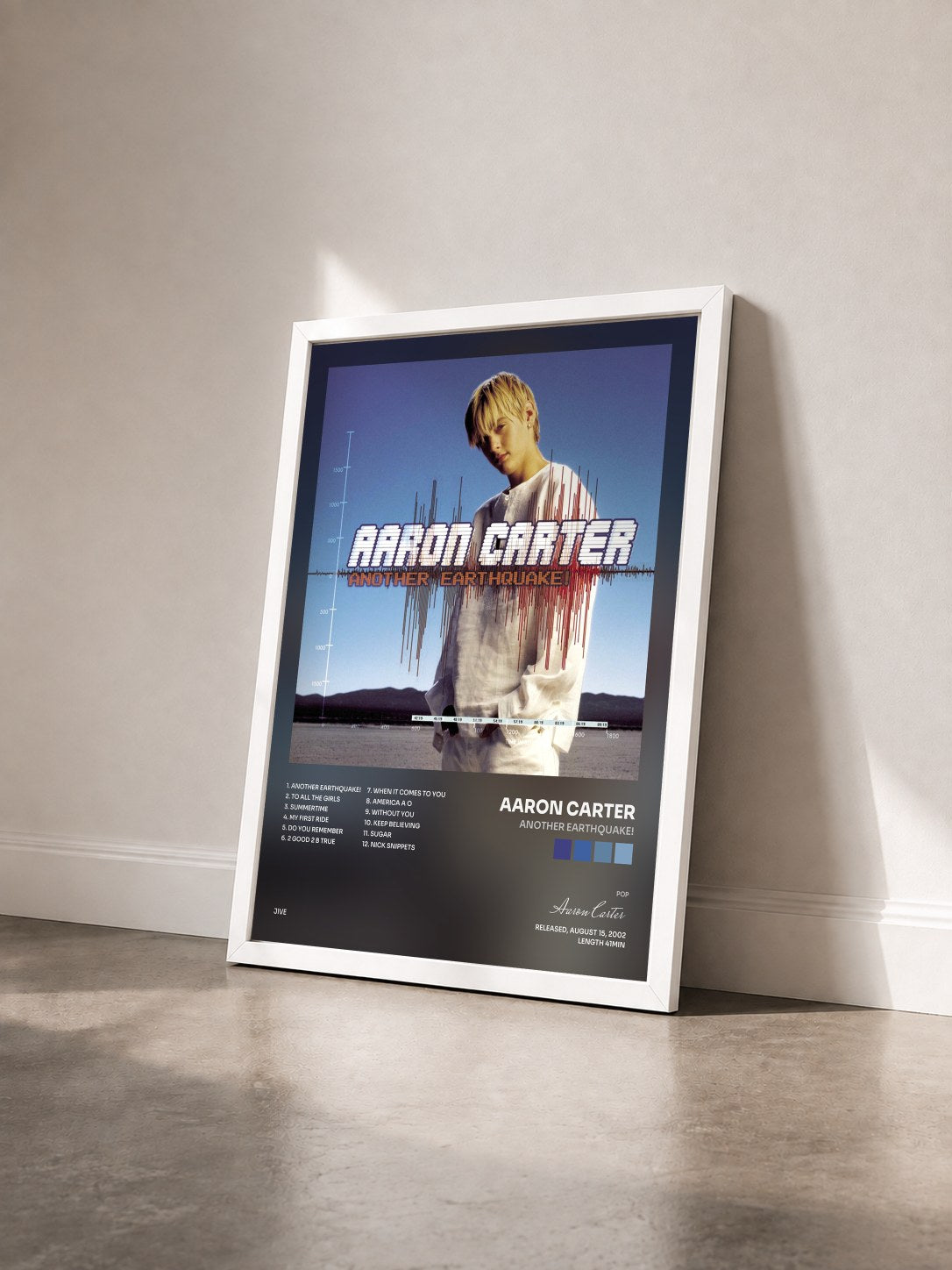 #blanc Tableau de l'album Another Earthquake! de Aaron Carter vu de trois quarts, cadre blanc