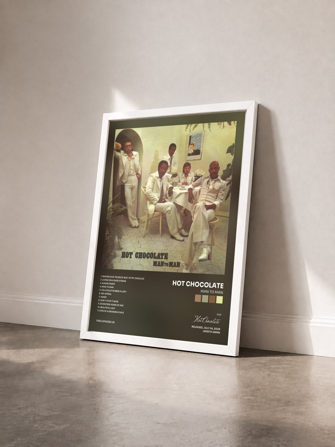 #blanc Tableau de l'album Man to Man de Hot Chocolate vu de trois quarts, cadre blanc