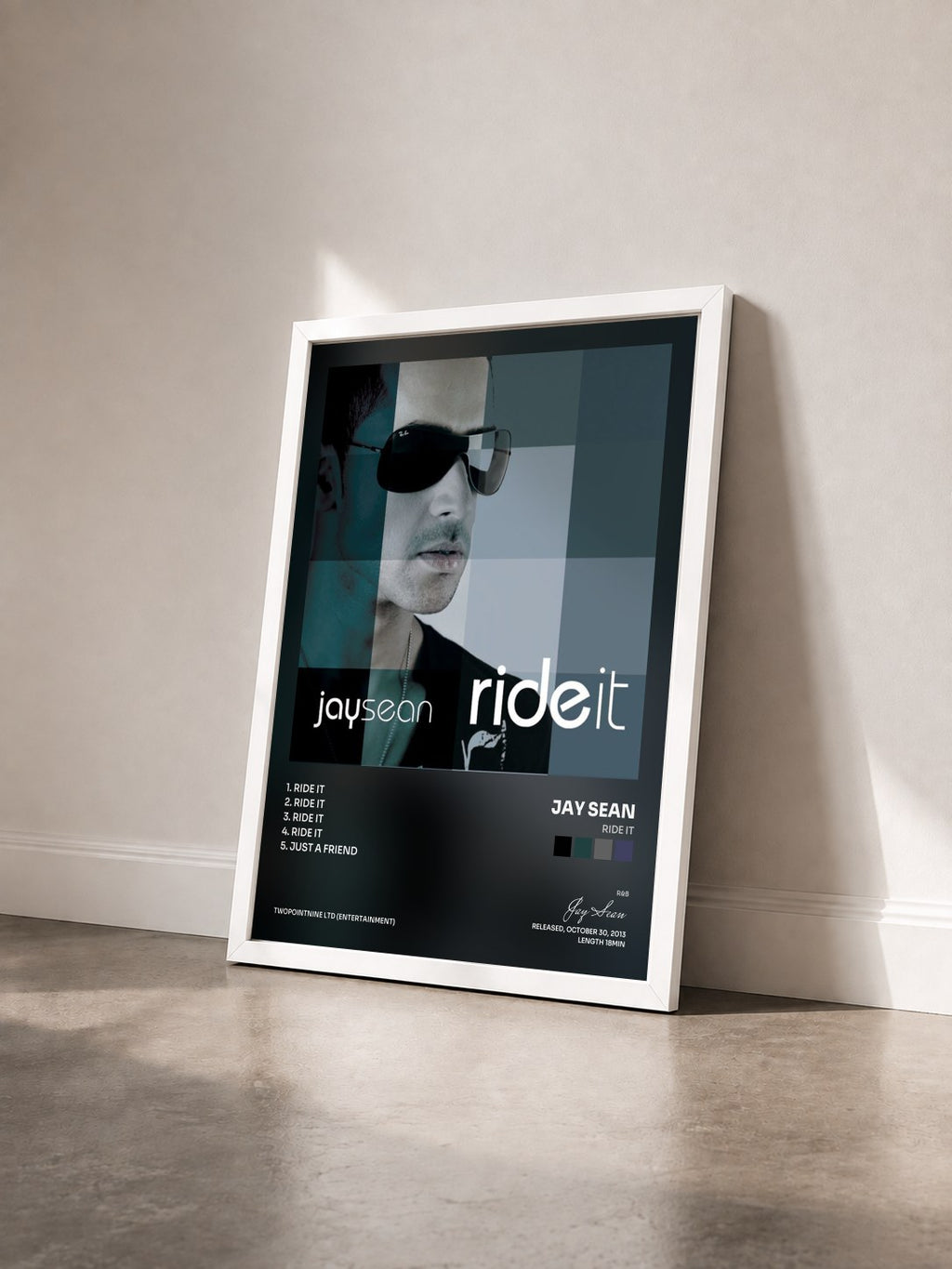 #blanc Tableau de l'album Ride It de Jay Sean vu de trois quarts, cadre blanc