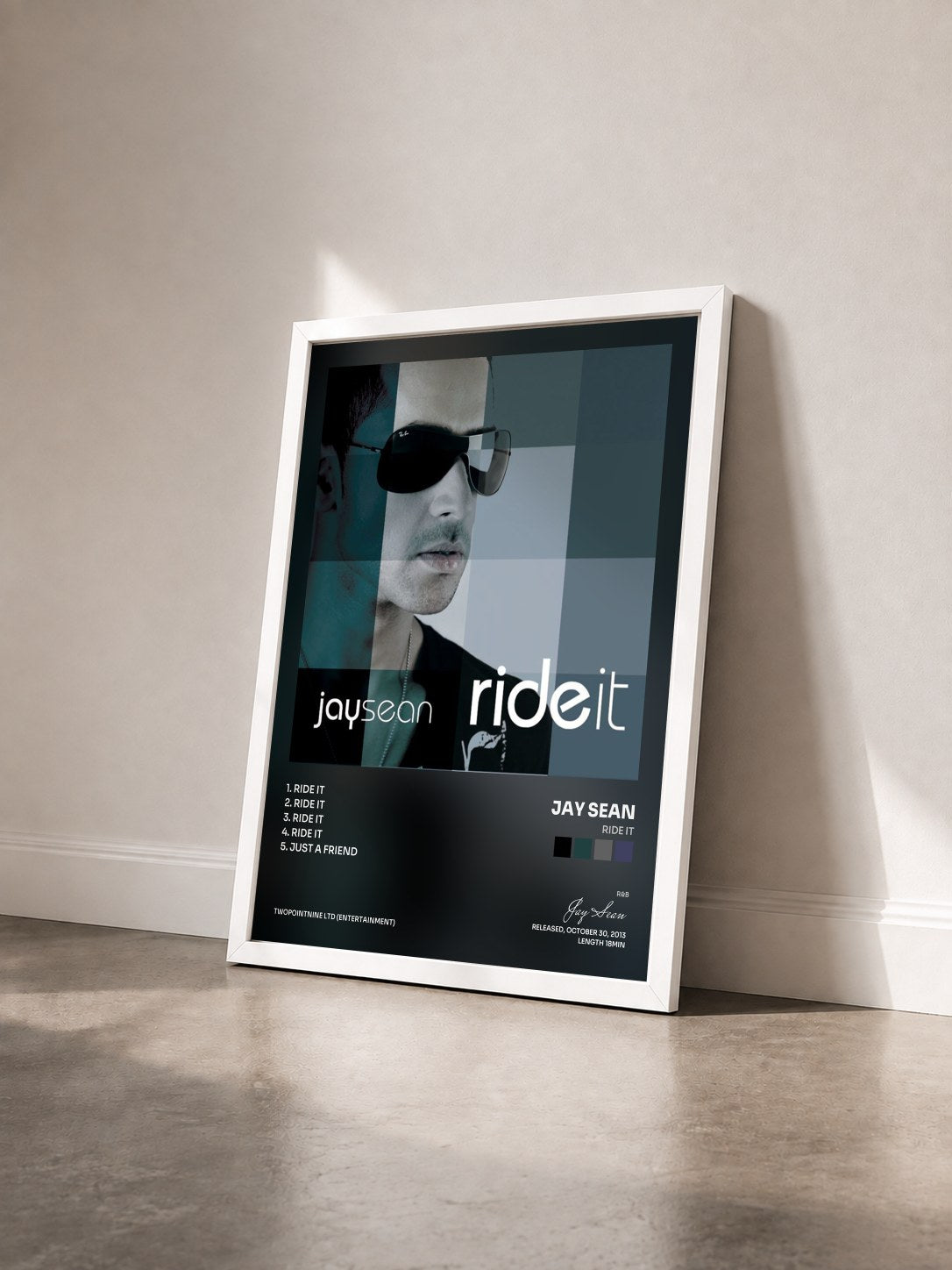 #blanc Tableau de l'album Ride It de Jay Sean vu de trois quarts, cadre blanc