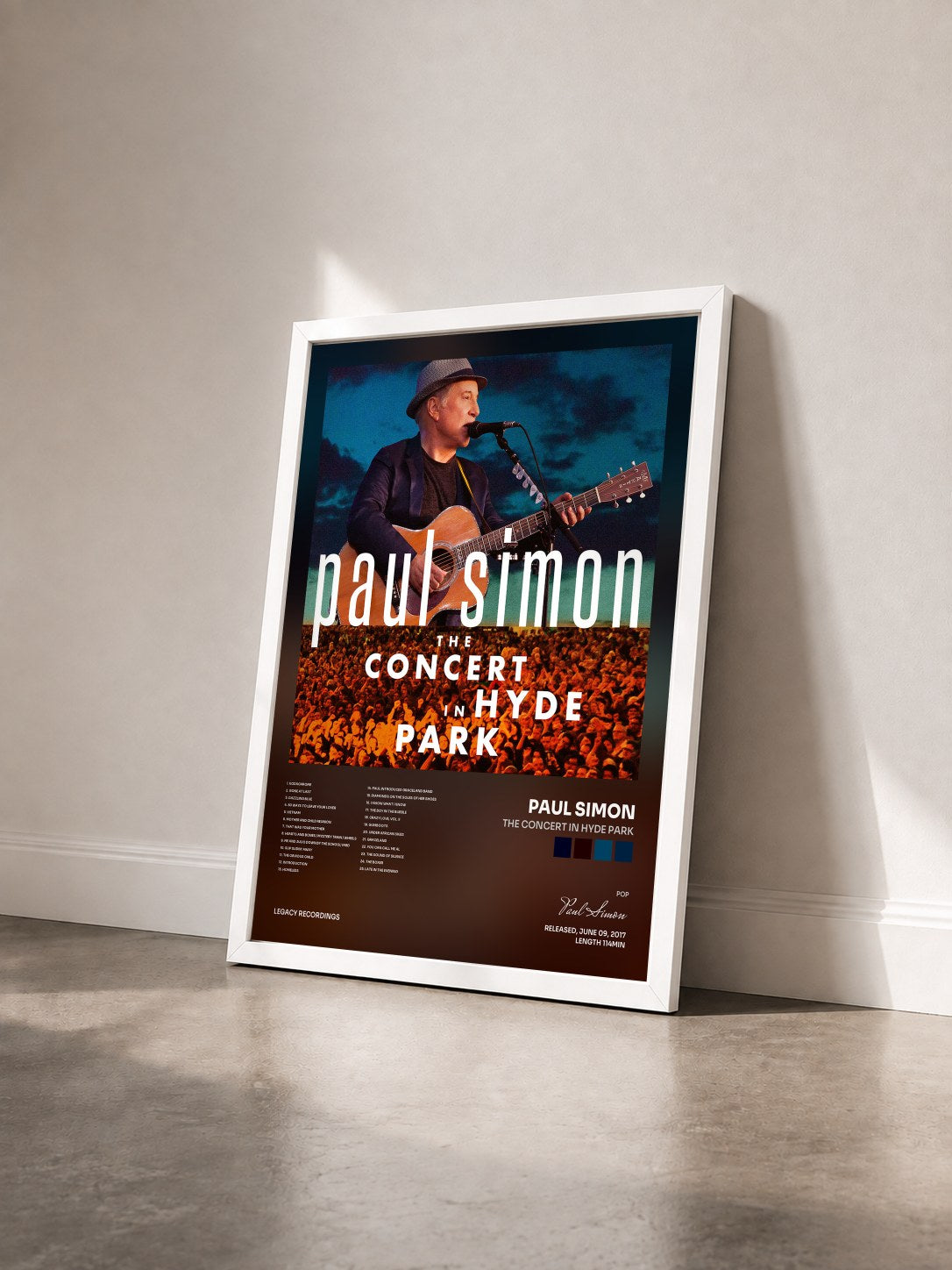 #blanc Tableau de l'album The Concert in Hyde Park de Paul Simon vu de trois quarts, cadre blanc