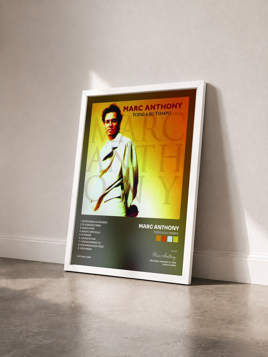 #blanc Tableau de l'album Todo A Su Tiempo de Marc Anthony vu de trois quarts, cadre blanc