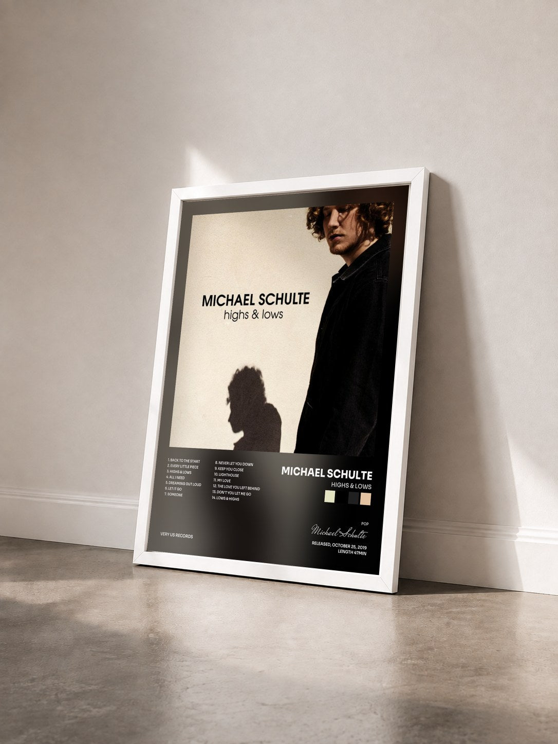 #blanc Tableau de l'album Highs & Lows de Michael Schulte vu de trois quarts, cadre blanc