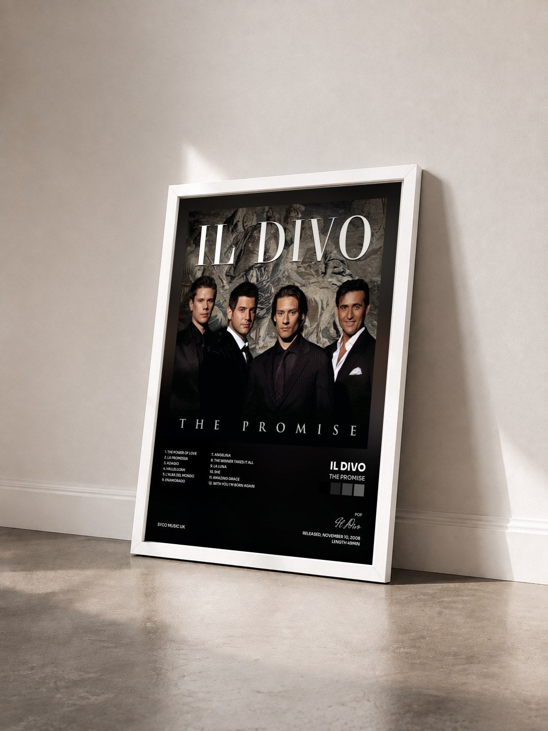#blanc Tableau de l'album The Promise de Il Divo vu de trois quarts, cadre blanc