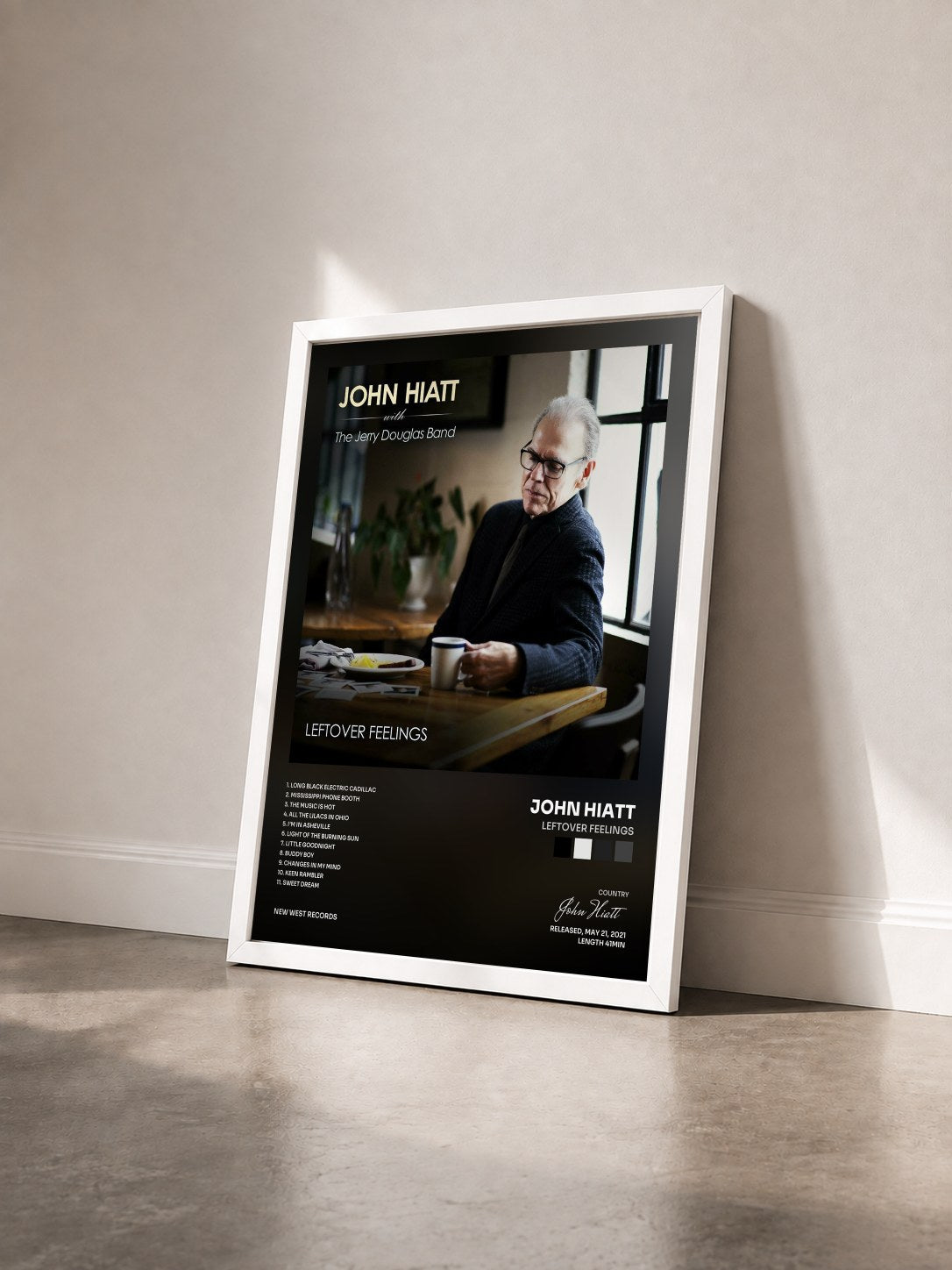 #blanc Tableau de l'album Leftover Feelings de John Hiatt vu de trois quarts, cadre blanc