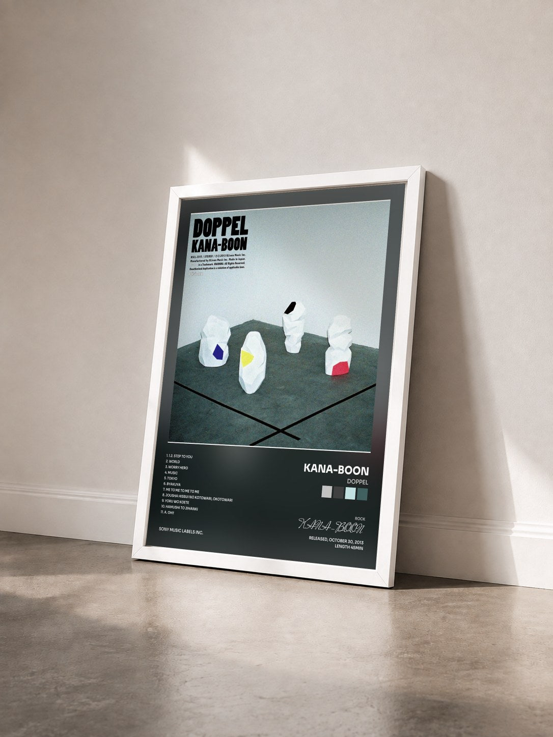 #blanc Tableau de l'album DOPPEL de KANA-BOON vu de trois quarts, cadre blanc