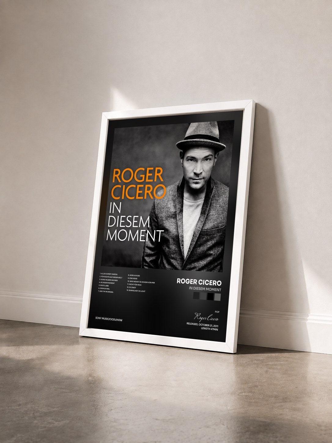 #blanc Tableau de l'album In diesem Moment de Roger Cicero vu de trois quarts, cadre blanc