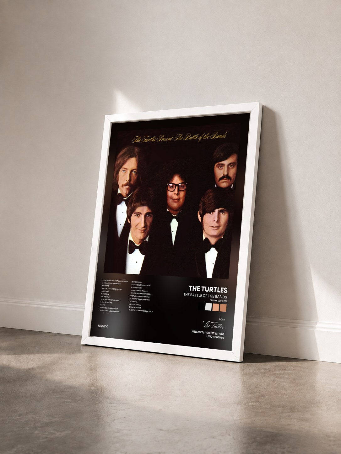 #blanc Tableau de l'album The Battle of the Bands (Deluxe Version) de The Turtles vu de trois quarts, cadre blanc