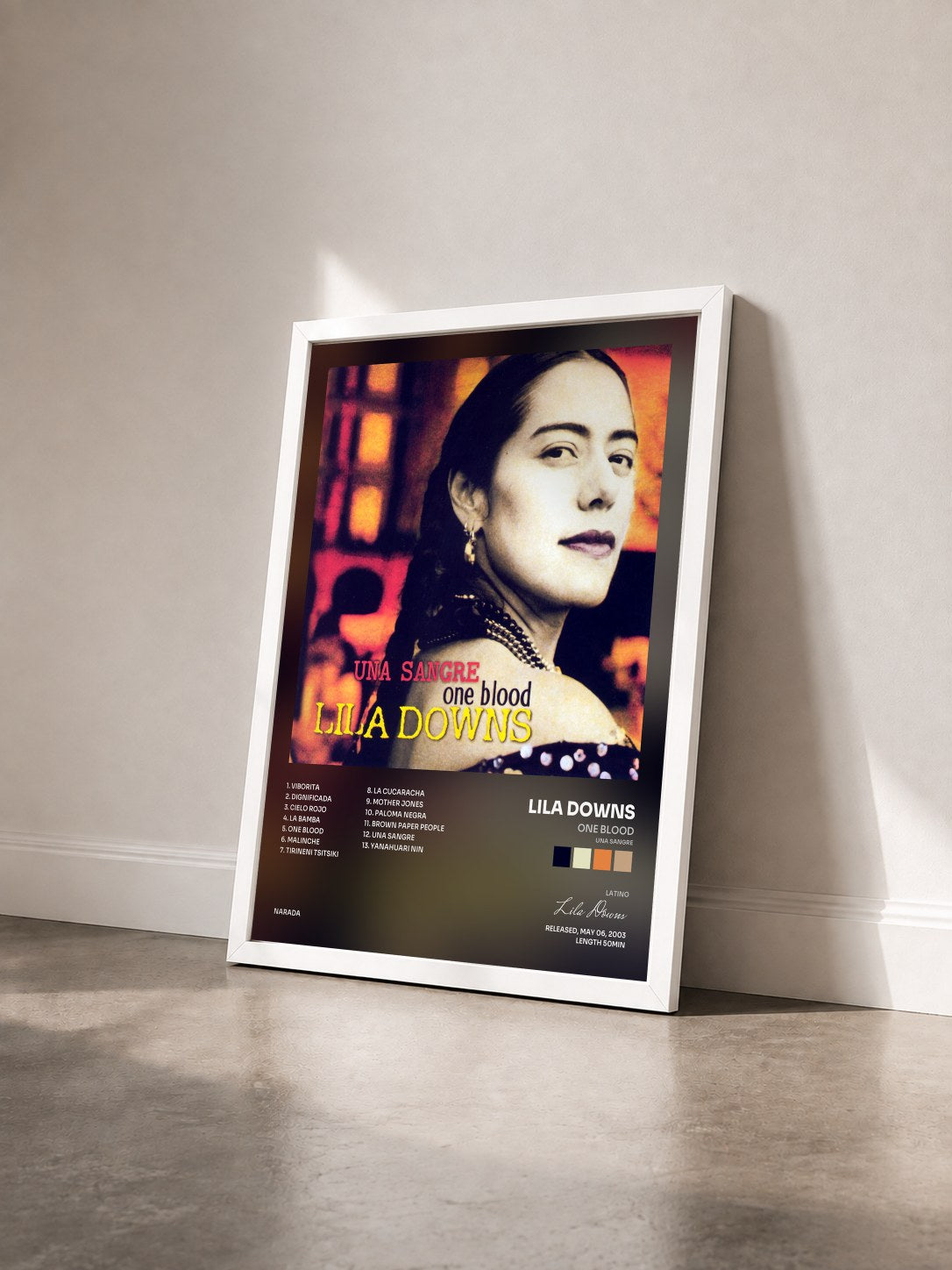 #blanc Tableau de l'album One Blood (Una Sangre) de Lila Downs vu de trois quarts, cadre blanc