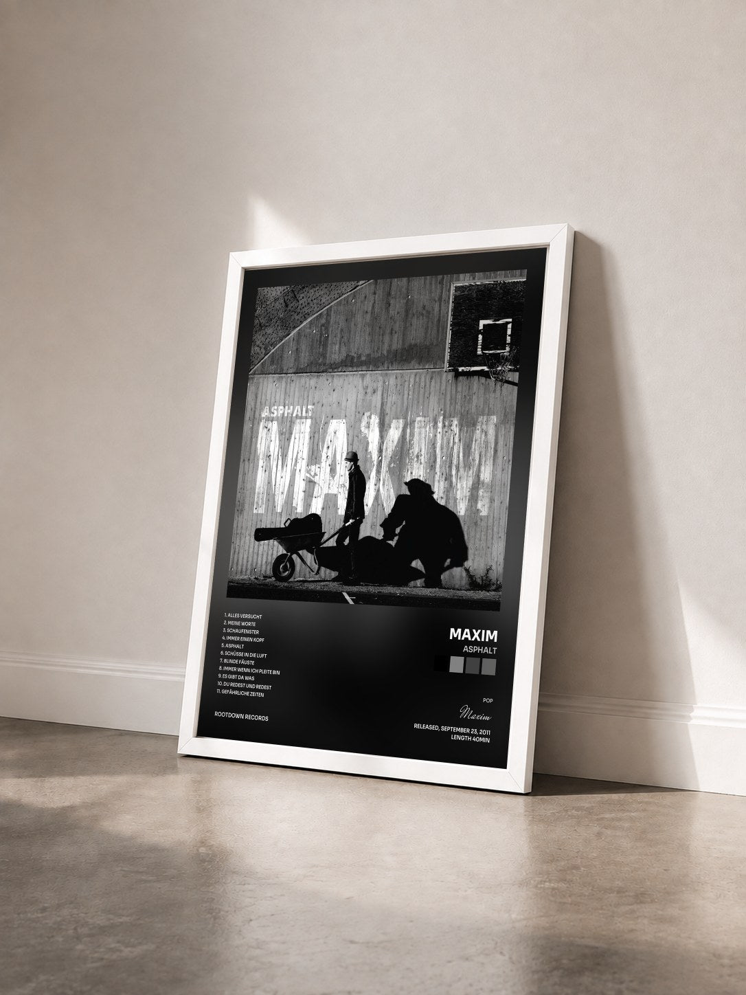 #blanc Tableau de l'album Asphalt de Maxim vu de trois quarts, cadre blanc