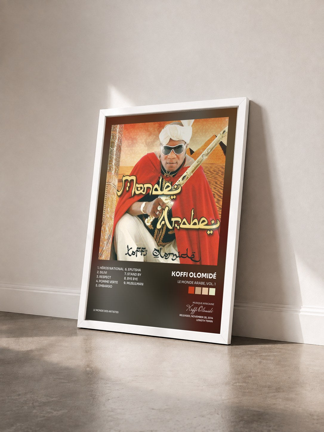 #blanc Tableau de l'album Le monde arabe, vol. 1 de Koffi Olomidé vu de trois quarts, cadre blanc
