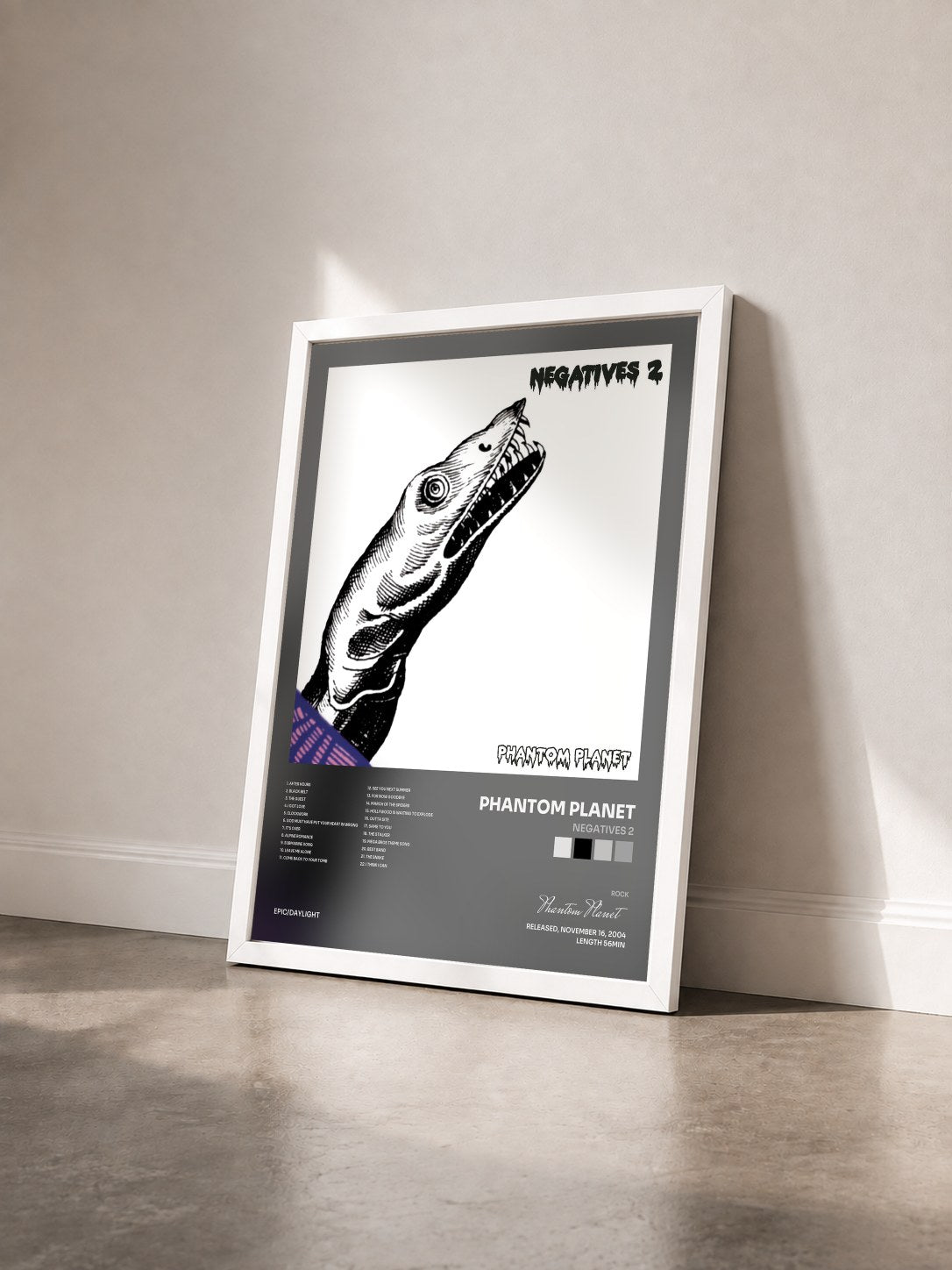 #blanc Tableau de l'album Negatives 2 de Phantom Planet vu de trois quarts, cadre blanc