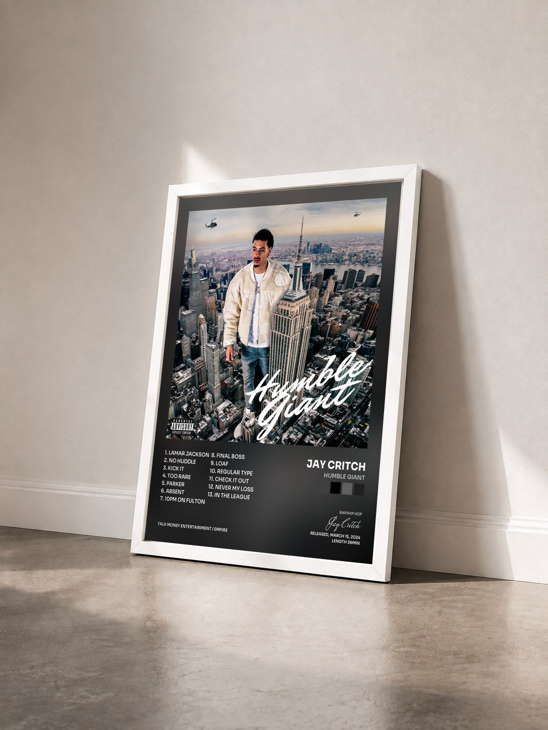 #blanc Tableau de l'album Humble Giant de Jay Critch vu de trois quarts, cadre blanc