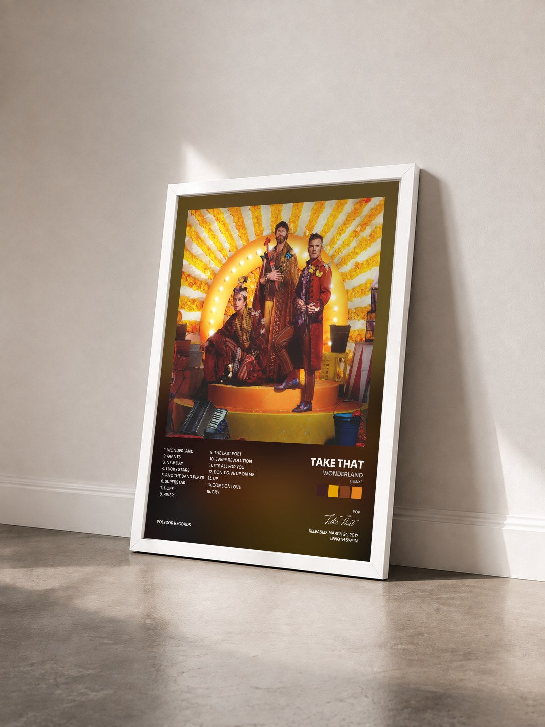 #blanc Tableau de l'album Wonderland (Deluxe) de Take That vu de trois quarts, cadre blanc