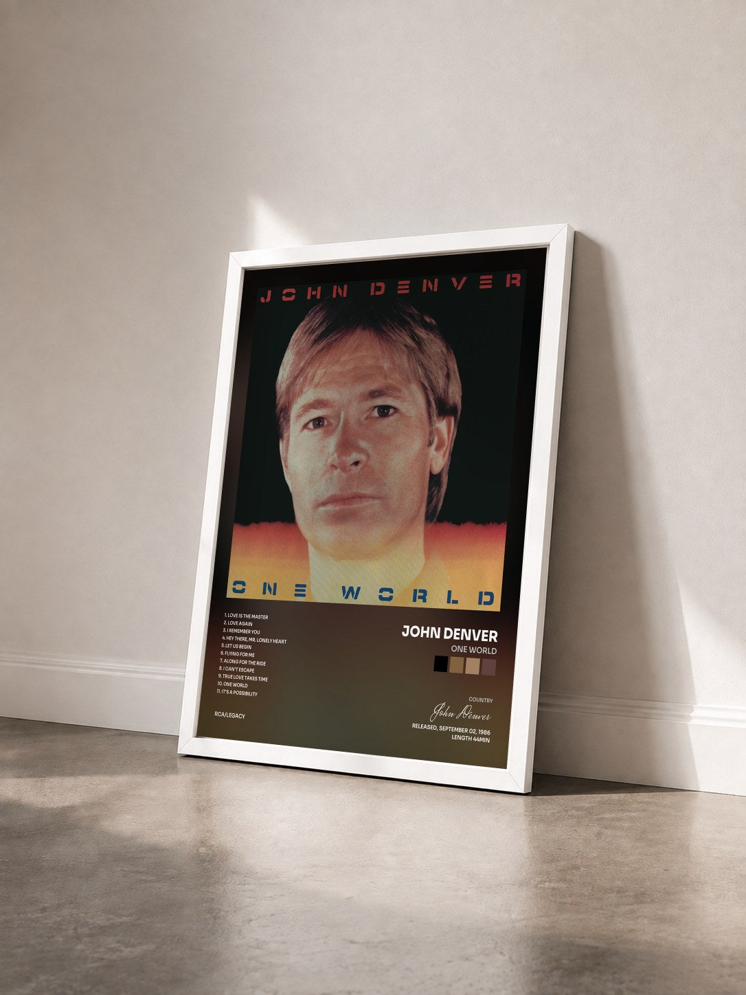 #blanc Tableau de l'album One World de John Denver vu de trois quarts, cadre blanc